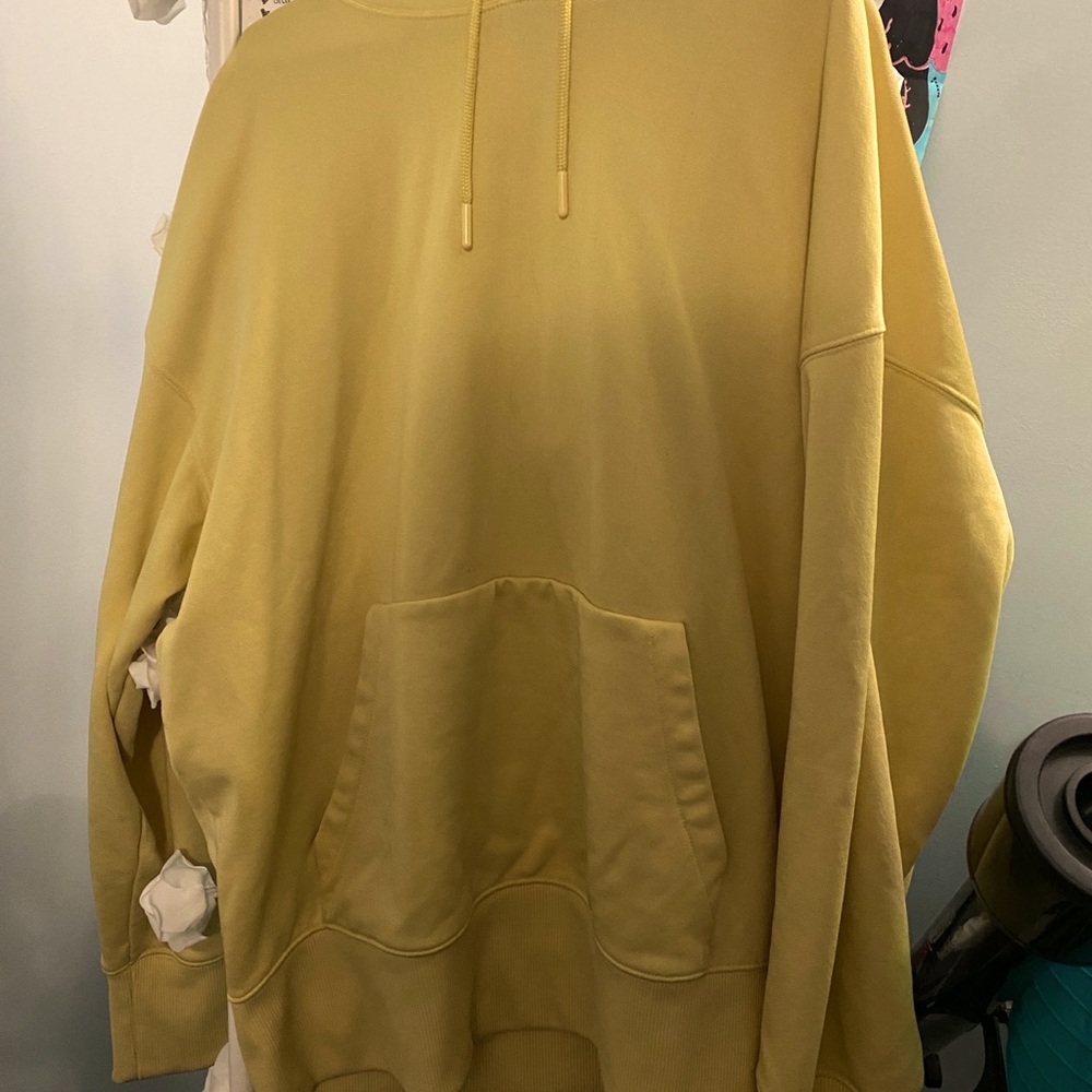 H&M MENS yellow hoodie.